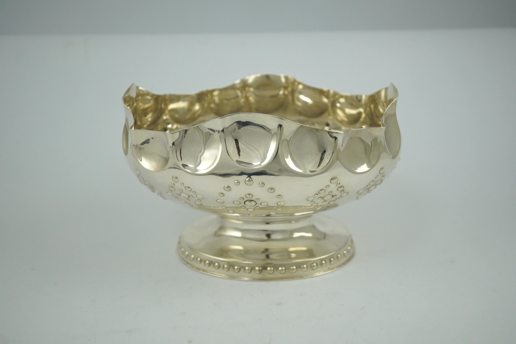 A late Victorian silver oval pedestal fruit bowl by Elkington & Co